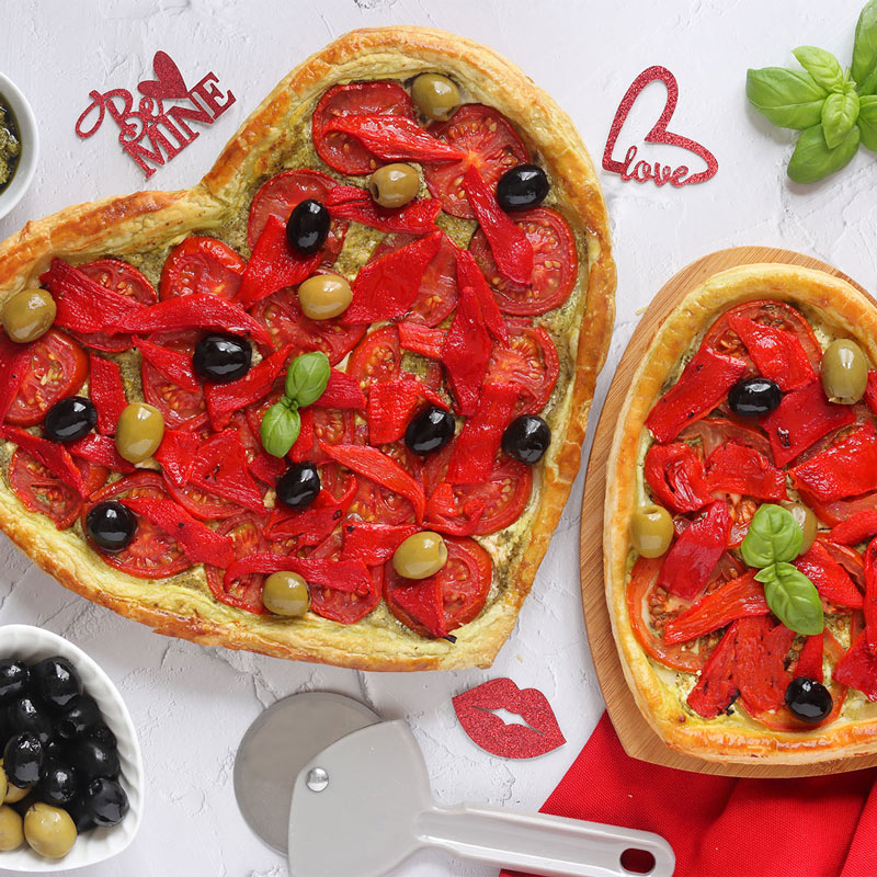 A heart shaped puff pastry tart topped with Fragata Olives - recipe